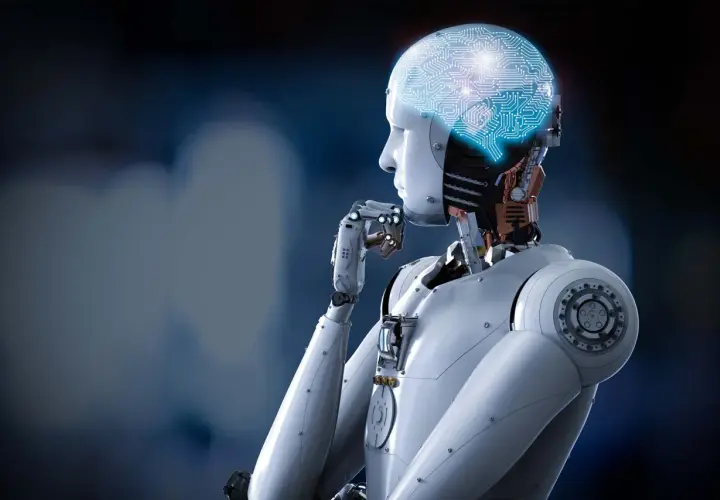 Robot z świecącym mózgiem w kształcie obwodów drukowanych, zastanawiający się nad tym, czym jest kognitywistyka.